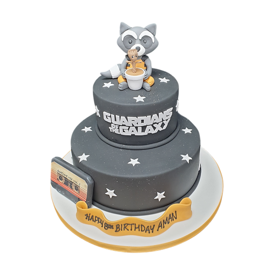 Bespoke Guardians of the Galaxy cake featuring Baby Groot and Rocket Raccoon figures, Solihull, West Midlands.