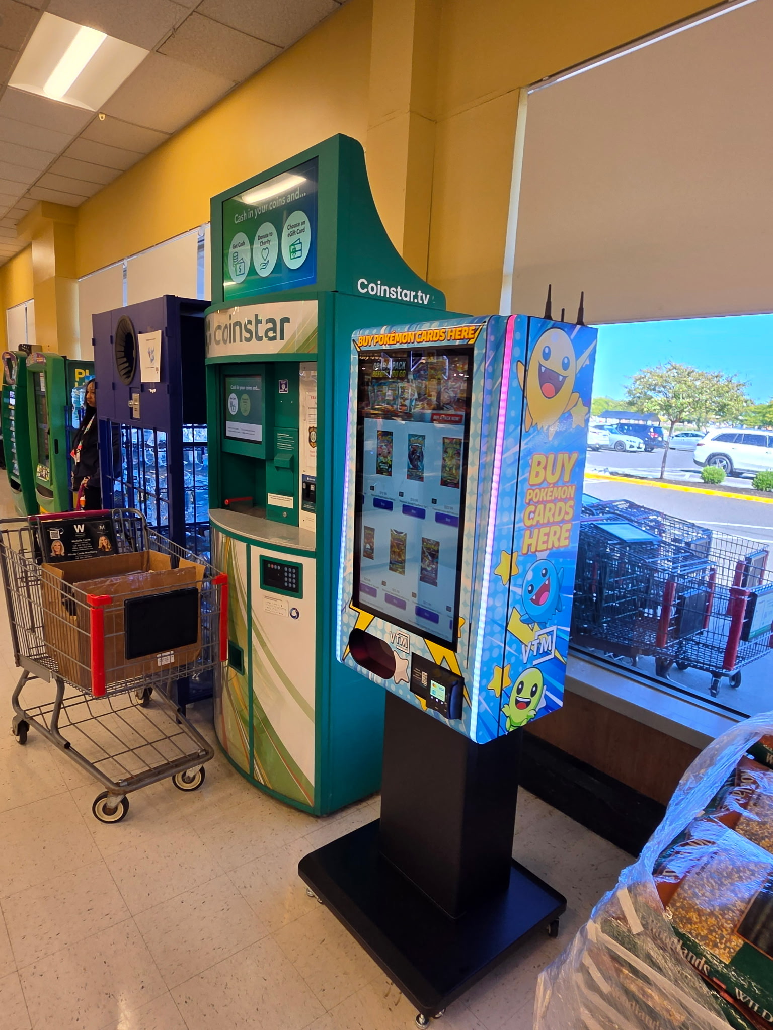 Freestanding trading card vending machine installed in a retail location