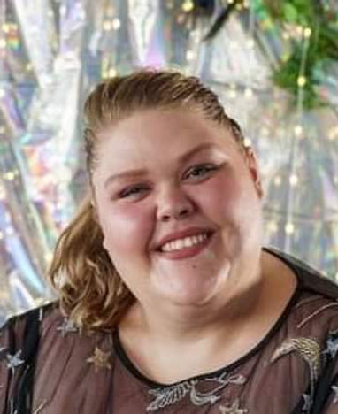 an image of a woman named Katherine Briggs who is on the board for event planning & community engagement