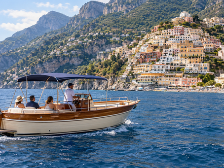 AI illustration of a day boat offshore from a Positano-inspired hillside town