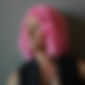 Woman with a pink wig.