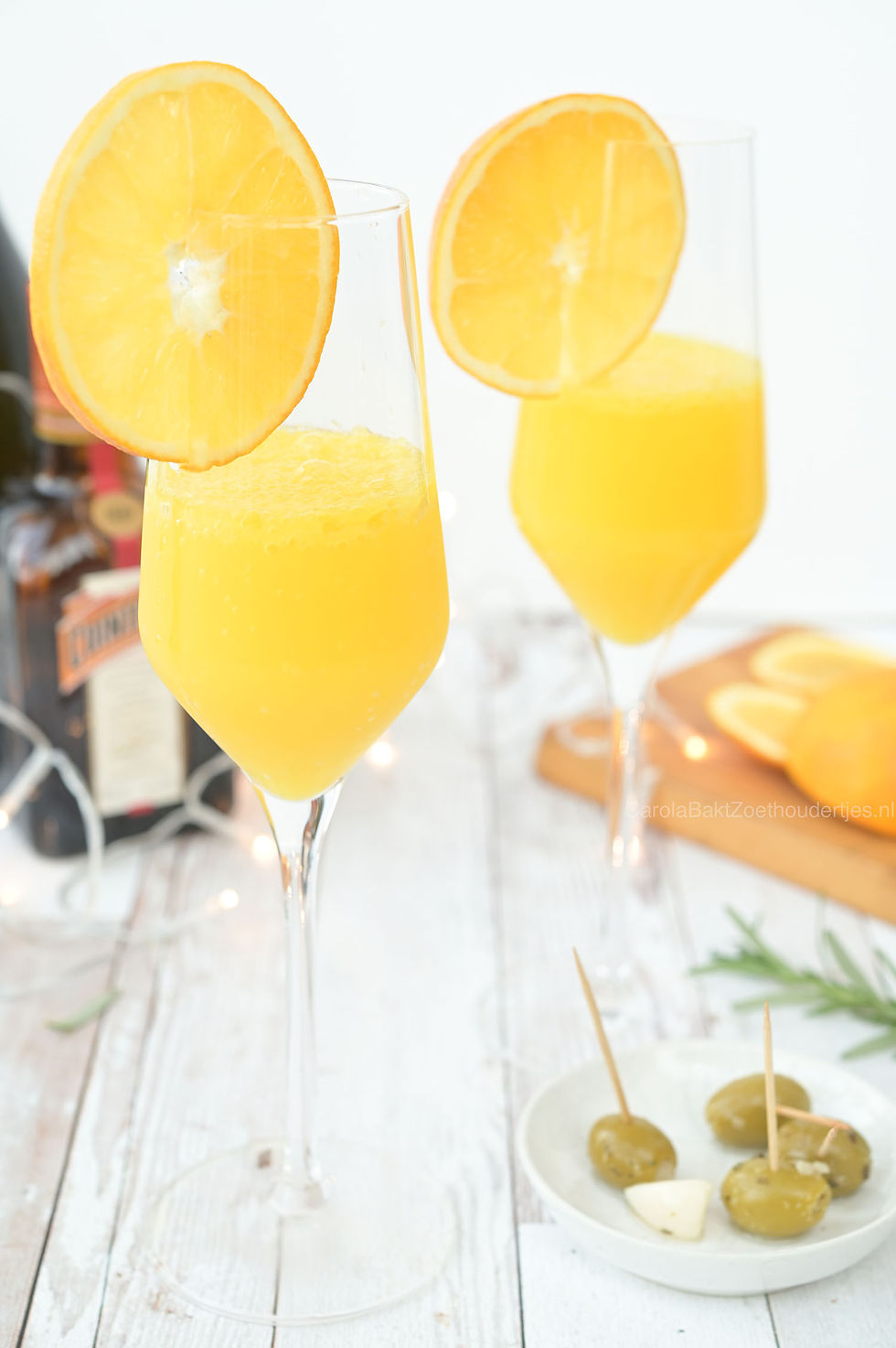 Licht alcoholische cocktail voor brunches en feestdagen; Mimosa recept