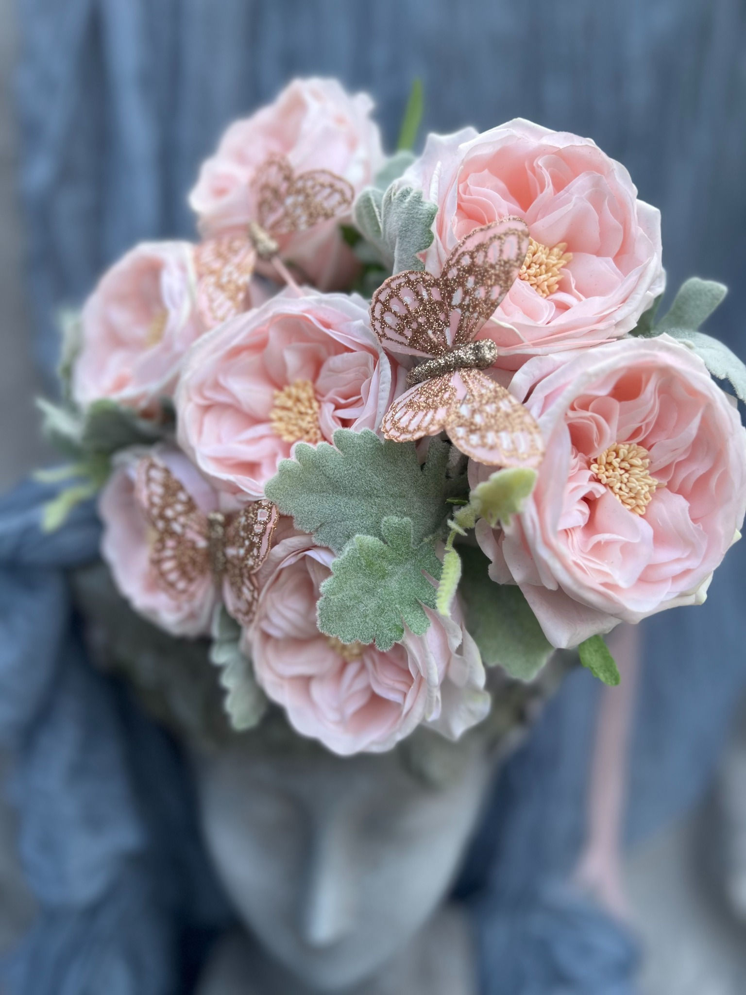 Athena's Garden blush pink real-touch rose hand-tied wedding bouquet with butterflies