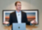 Chris Hodges speaking before a group