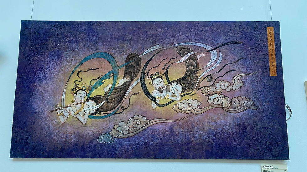 A contemporary reinterpretation of Dunhuang murals features Flying Apsaras inspired by Tang Dynasty mural styles—created by using Dunhuang sand-based foundation, mixed with mineral and plant-based pigments. (Photo by Xinyu.)