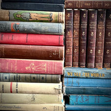 Vintage and antique books in various colors.