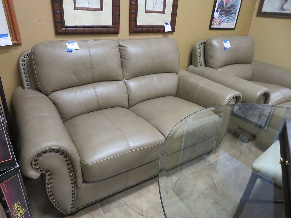 "Abbyson " Taupe Leather Love Seat $600.00