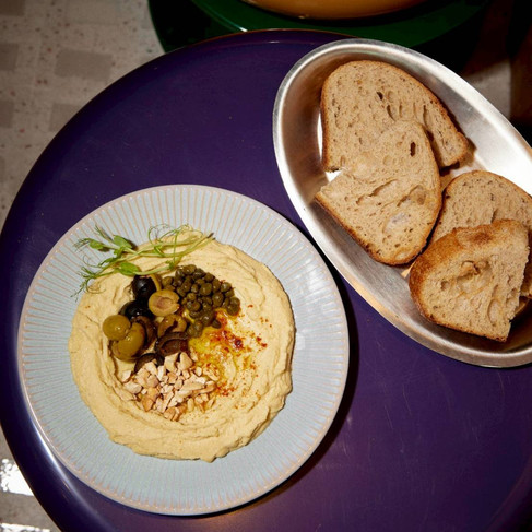 Hummus with olives and caper barries at Fikka at Siam Paragon