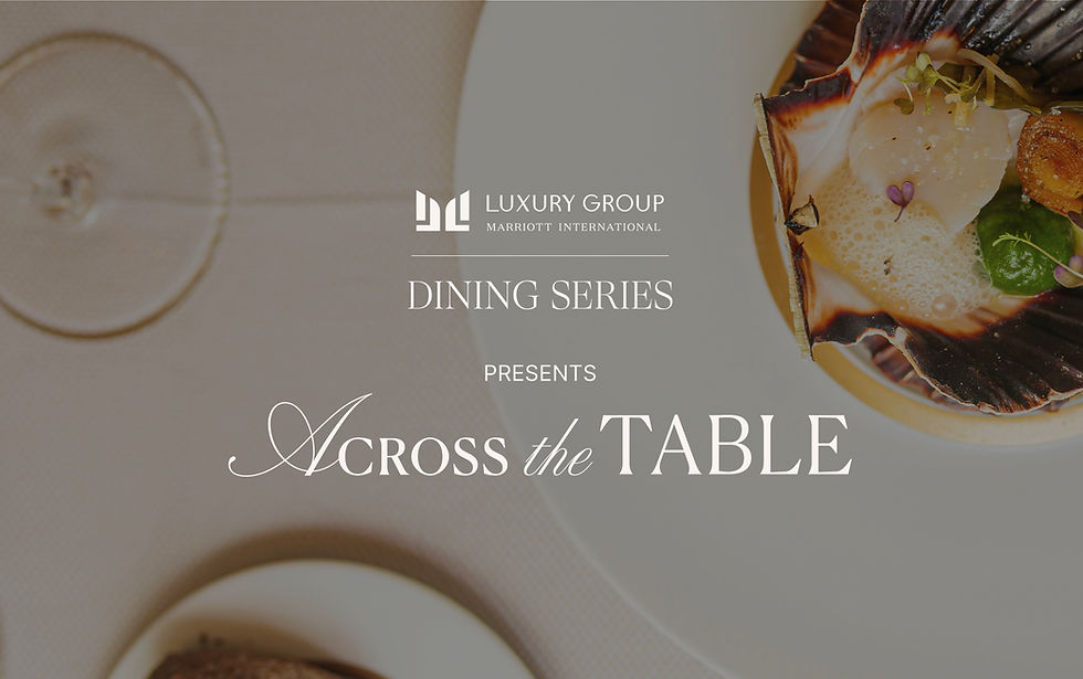 Plate of gourmet food on a table with text: "Luxury Group Marriott International Dining Series presents Across the Table." Elegant and sophisticated.