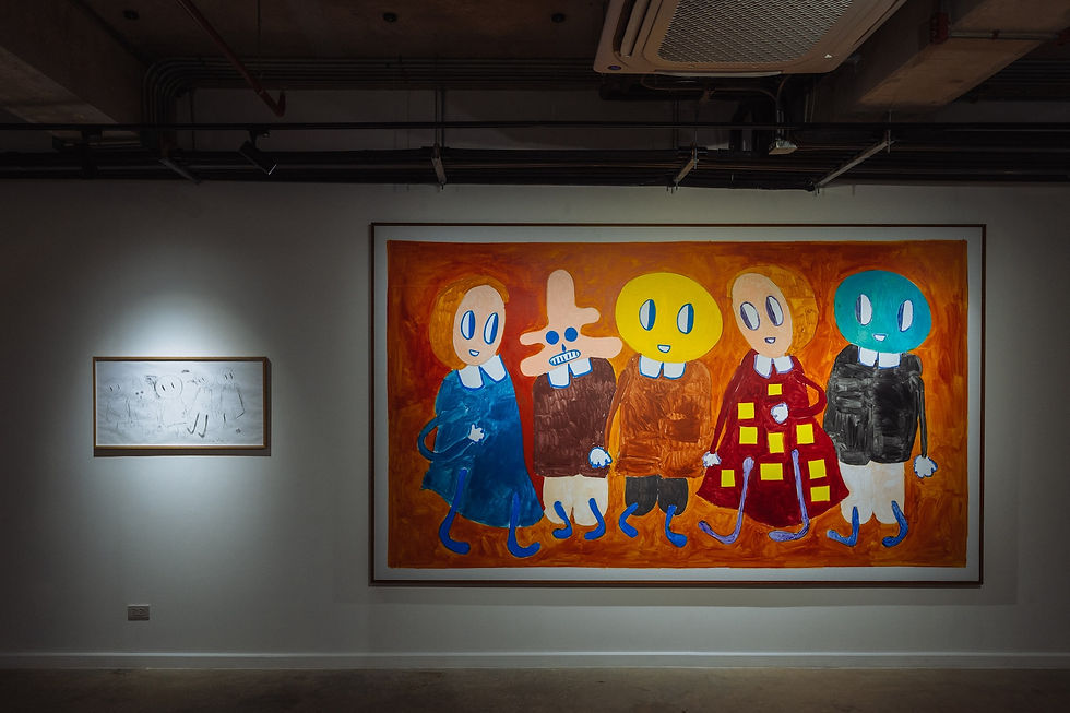Art gallery wall with two framed paintings: a small sketch and a large colorful group portrait of five cartoon figures.