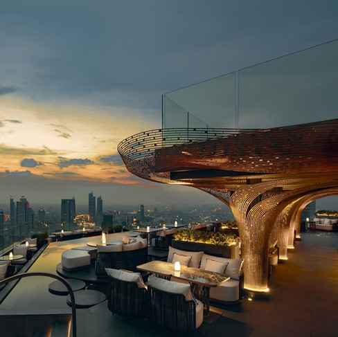 Chef Thitid Tassanakajohn brings Thai fine dining to the skies at Le Du Kaan, a dramatic rooftop concept celebrating regional Thai flavors. 