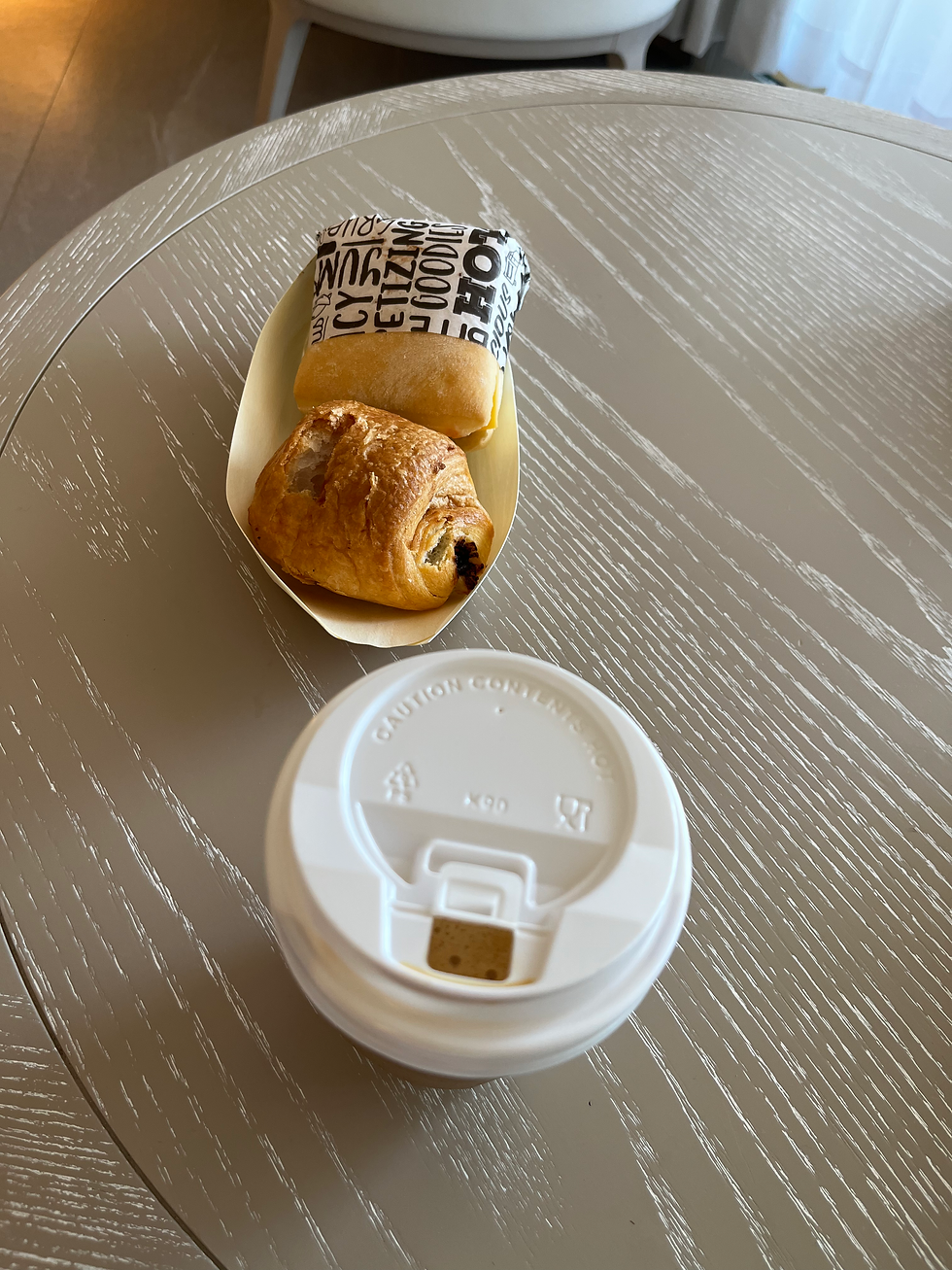 Sandwich, croissant, and coffee from Blue Mountain Coffee Shop