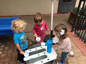 courtyard water play O,H,L.jpeg
