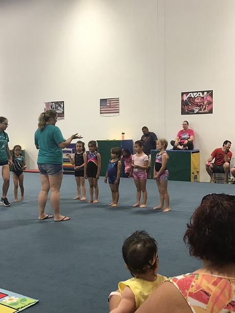 Angie with 5 girls at showcase.jpg