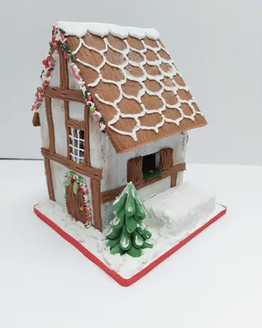 Victorian White & Beam House
A charming gingerbread interpretation of a classic Victorian home, featuring crisp white walls and distinctive dark timber beams.
