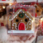 A mini fairy tale gingerbread house in red and white