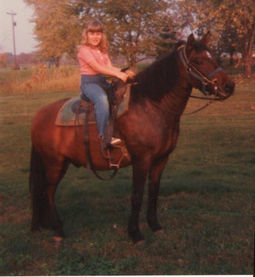Jennifer Sheerin Western Tack Trader sitting on her first pony.