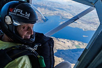 Skydiver about to exit plane.jpg