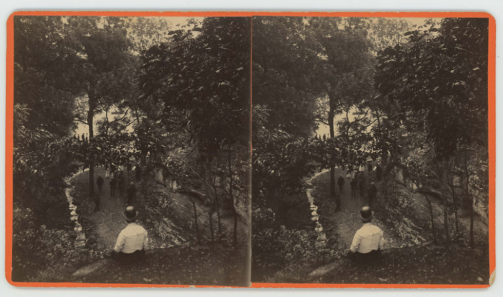 Two nearly identical side-by-side images of a man sitting on top of Gibony Cave in Doling Park.