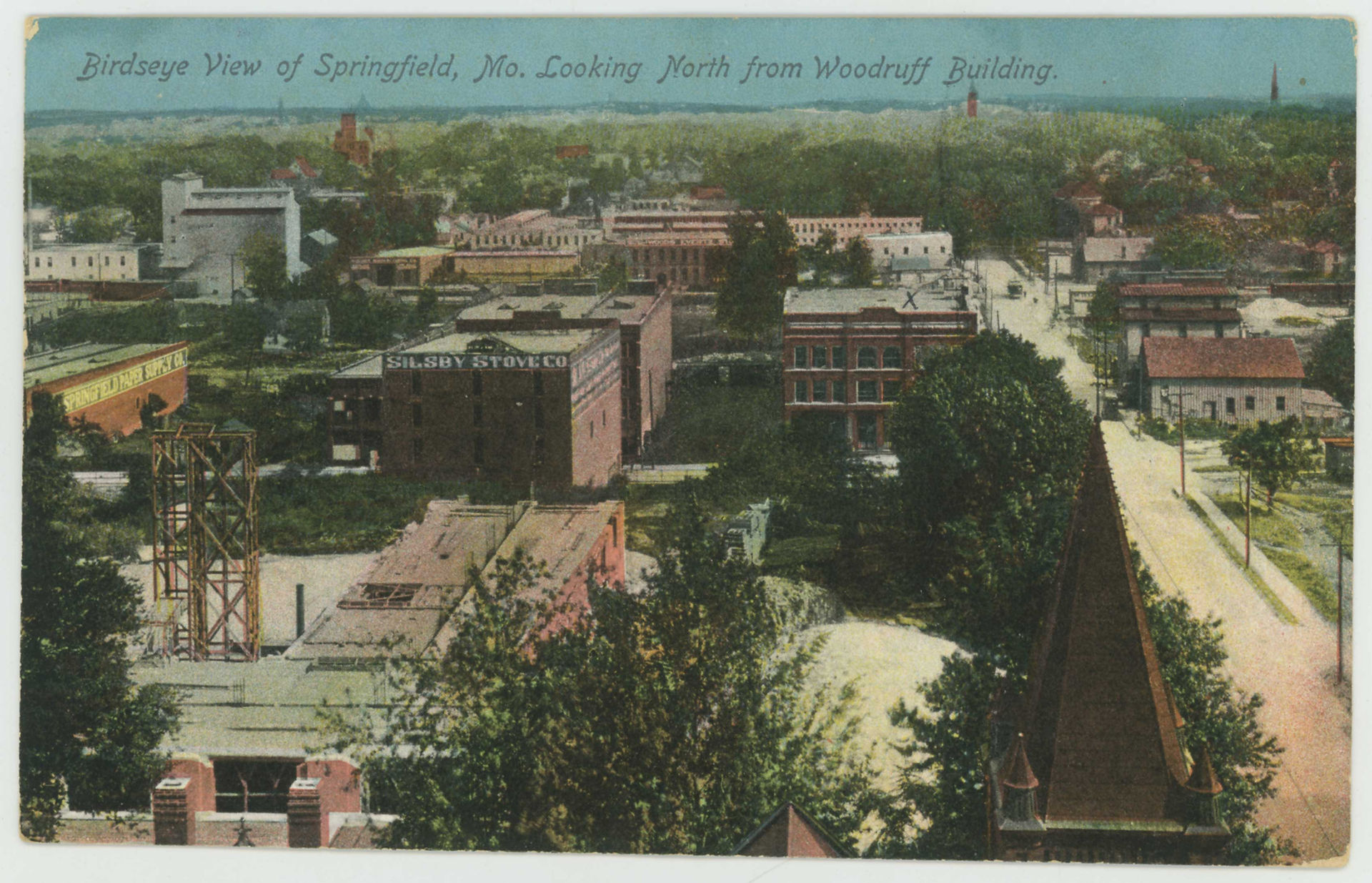 Water Street in 1912 showing Milligan's grocers at the corner