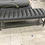 Thumbnail: GRAY LEATHER AND WOOD BENCH