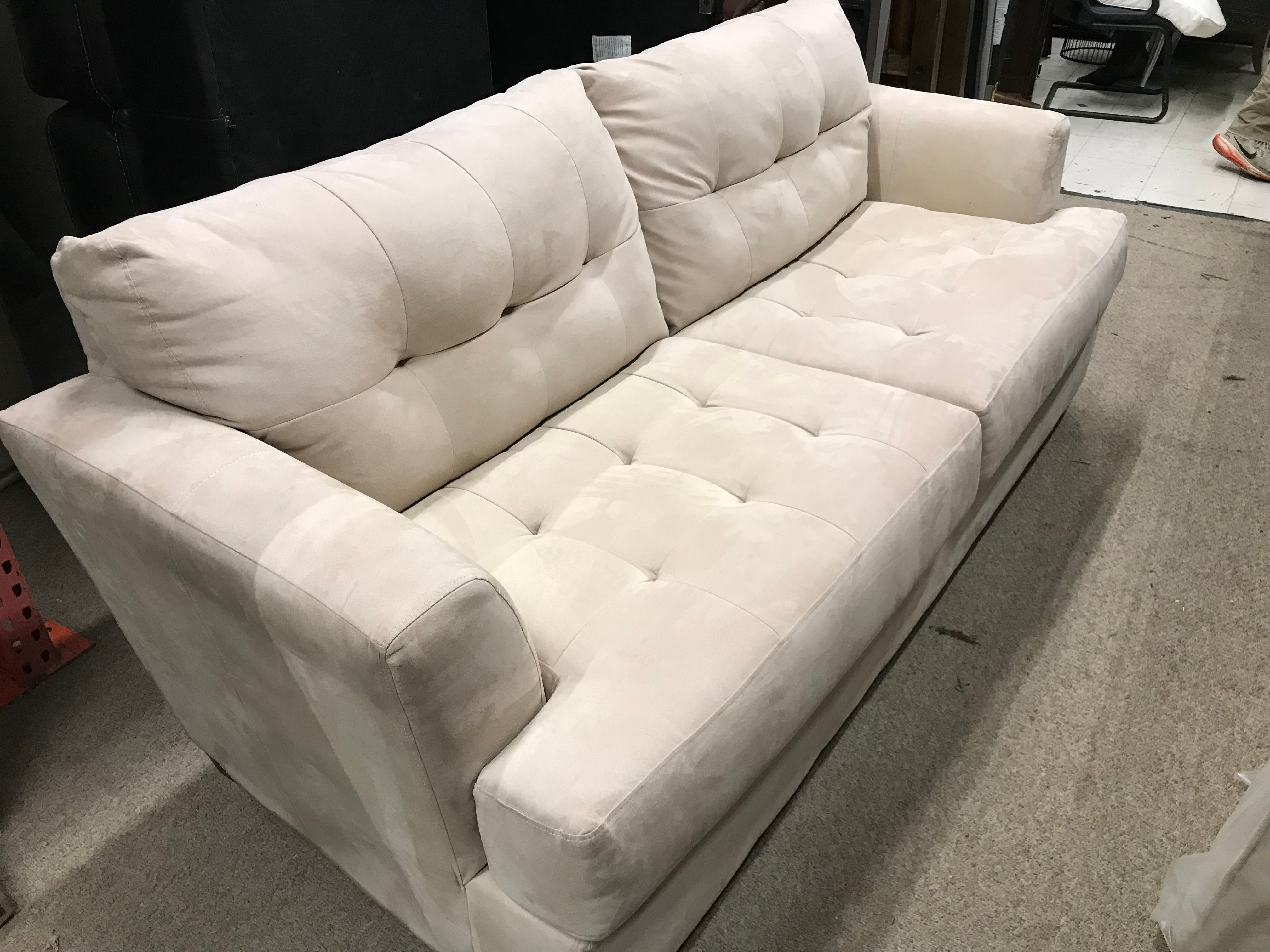 IVORY TUFTED SOFA