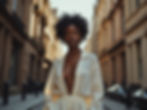 Woman in cream shirt on a city street