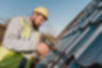 sideways man working roof