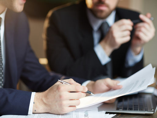 Two Florida business partners shaking hands without an operating agreement