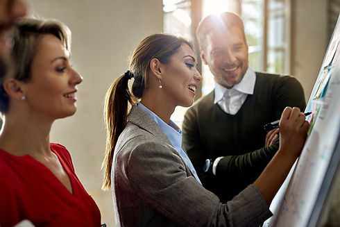 group-entrepreneurs-cooperating-while-creating-mind-map-whiteboard-office-focus-is-busines