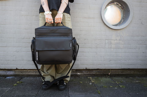 Person holding Solid Blaze Vinyl- Bag