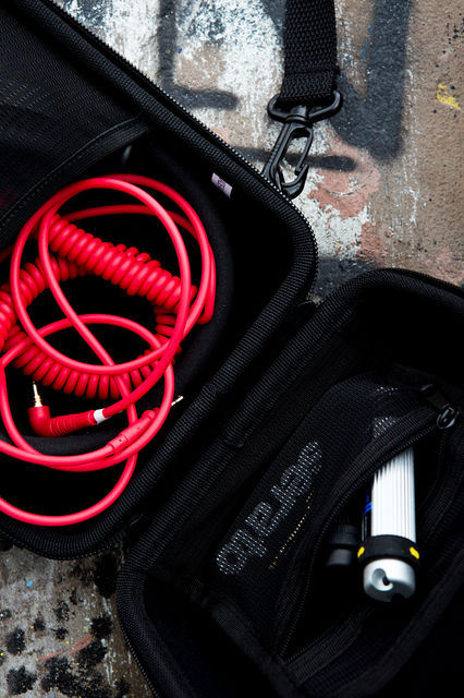 Open black HEADPHONE-CASE II cables and accessories