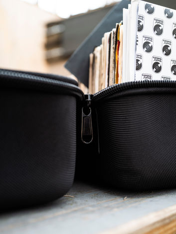 45 Sandwich Dusty Donuts Edition carrying case filled with 7 inches