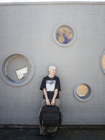 DJ Lu  with Solid Blaze Vinyl- Bag against wall