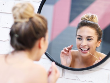 Here’s How to Use Dental Floss For the Best Results