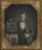 (source: By UnknownRestored by Wcamp9 - This file was derived from: Portrait of a Daguerreotypist, 1845.jpg, Public Domain, https://commons.wikimedia.org/w/index.php?curid=157814697)