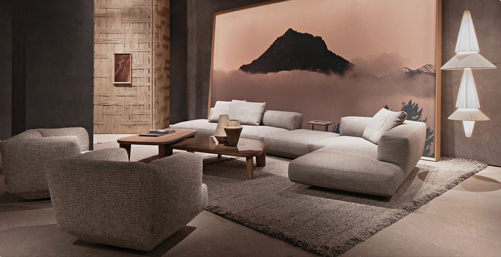 Authorized Baxter furniture flagship showroom AD Atelier Design in Sarasota Florida displaying artisanal hand-cast leather sofas integrated with museum-tier fine art brokered collections for custom estates in The Founders Club.