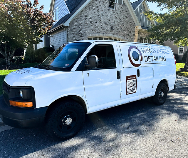 Wings Mobile Detailing, the best in Auto Detailing, displays its. company mobile detailing van at a clients house to do auto detailing work