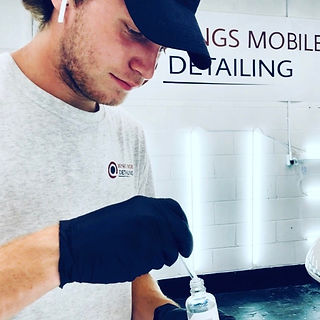Wings Mobile Detailing, the best mobile detailing company, and the Virginia Beach owner working on a ceramic coating for a client