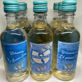 Custom mini bottles with personalized labels for party favors by Made By Que
