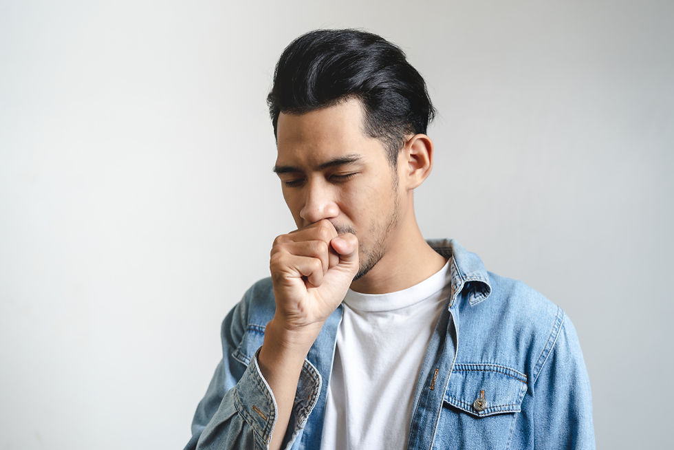 man coughing because of smoking