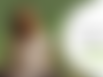 Woman in white shirt seated, looking up peacefully. Green tree background. Text: "WORKING WITH YOUR seasons" on white overlay.