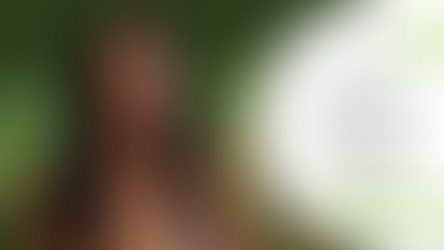 A woman with hands on her heart, eyes closed, in front of trees. Text reads: "What kind of self care do you need?" Calm mood.