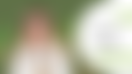 Woman in glasses covers face in frustration; text reads "HOW TO QUIT quitting." Green background with tree illustrations on left.