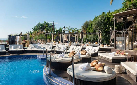 Weekend party energy at Puerto Banus beach club with DJs