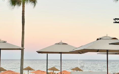 Relaxing lounge area by the pool at Sublime Beach in Estepona