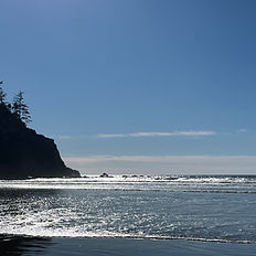 Rocky shoreline and surf conditions at Short Sands Beach Oregon Coast a popular beginner friendly surf spot
