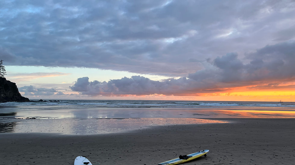 Beginner surf lesson at Short Sands Beach on the Oregon Coast with small clean waves and rocky headlands