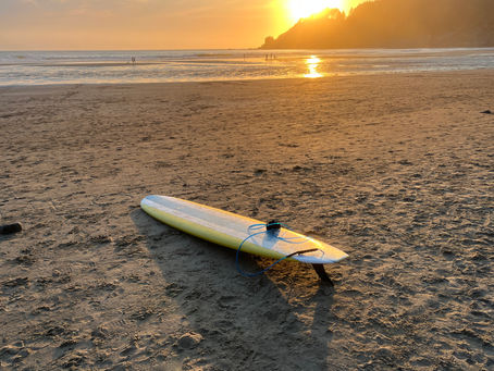What I Ride Surfboard pictured at Short Sands Beach during sunset on the North Oregon Coast