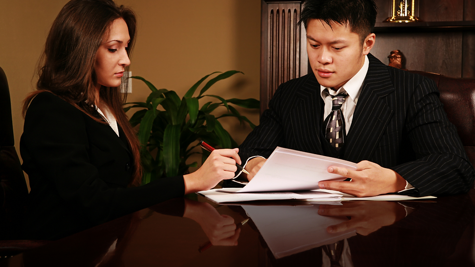 a lawyer having a client sign a document